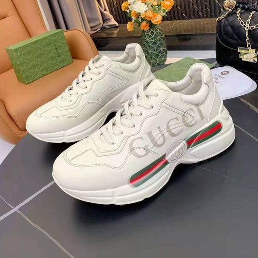 Tenis GG Rhyton Com Logo