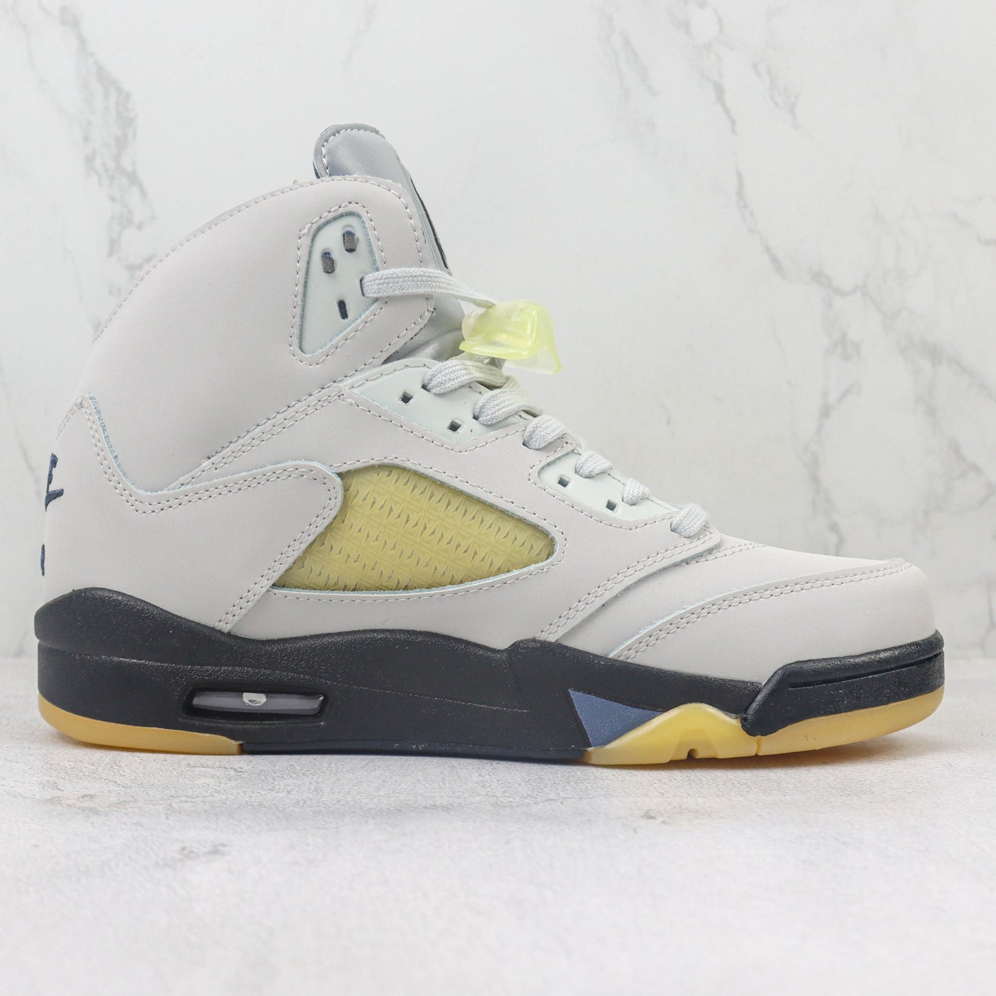 Tênis A Ma Maniere x AJ5 Photon Dust